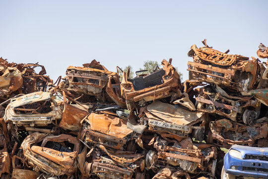 Sa'ad, Israel – May 9 2024, Cars remaining, burned cars after the attack on October 7th by Hamas. The cars were collected on the farmer's field and serves now as an attacks memorial and a remainder.