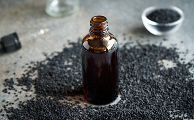 A bottle of black cumin or Nigella seed oil