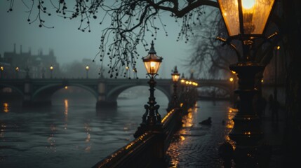 A foggy evening view of a bridge over the river thames in london