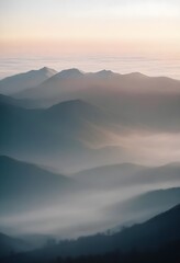 mountain layers and sunrise view in cold and foggy weather.