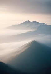 mountain layers and sunrise view in cold and foggy weather.