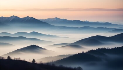 Obraz premium mountain layers and sunrise view in cold and foggy weather.