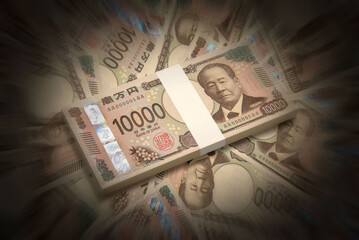 敷き詰められた新紙幣の一万円札と百万円の札束