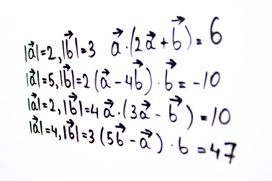 An algebraic equation written in marker on a white board. Math concepts, calculating equations.