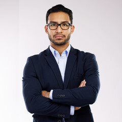 Man, business and glasses with arms crossed in studio for career, accountancy or finance job in portrait. Male accountant, white background and confident for corporate with pose, assertive or formal
