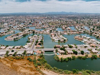 Residential housing and canal lake system at Arrowhead Lakes, Phoenix, Arizona, United States of America.