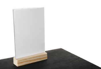 Menu holder on black wooden table against white background. Space for text