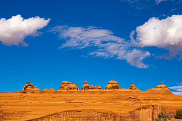 Rock formation under blue skies in Arches National Park