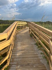 Fototapeta premium wooden bridge over sand dunes