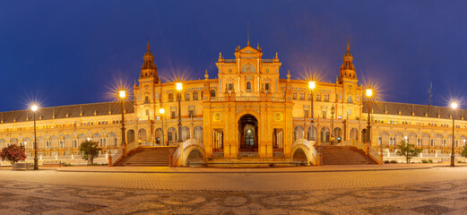 Panorama of Spain Square or Plaza de Espana in Seville at night, Andalusia, Spain