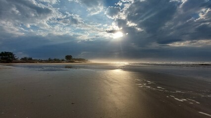 Stormy sky over the  Sea. The sun's rays make their way through the clouds.