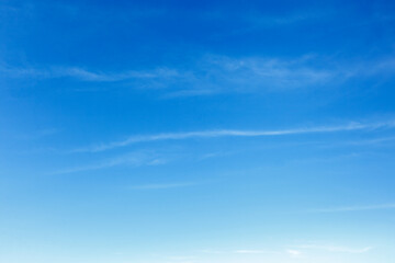 Peaceful and serene sky with white clouds background