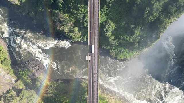Aerial Drone View Of Victoria Falls And Its Rainbows, In Between Zambia And Zimbabwe