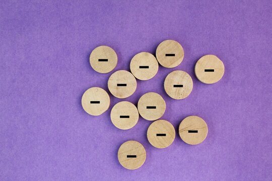 round group of sticks with a minus symbol. the concept of science or bad things. removing the weaknesses or negativity, positive thinking, negative feedback or subtraction