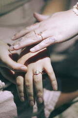 hands of the bride and bride