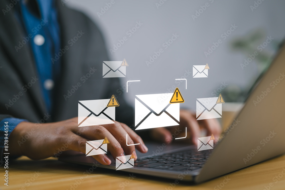 Aufkleber Email Spam concept. warning notification and spam message. Person using laptop with Spam email notification on virtual screen.
