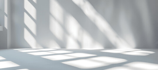 Fototapeta premium Minimalist Abstract Light and Shadow Overlay on White Wall for Product Presentation Mock-Up