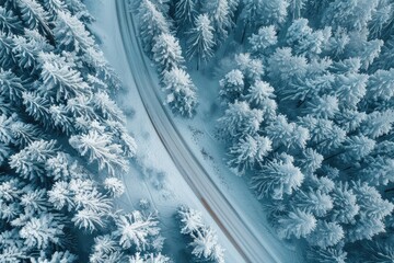 Drone aerial photography of roads between forests, snowy days