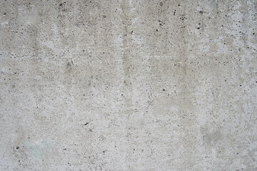 汚れたコンクリートの壁のテクスチャーのクローズアップ