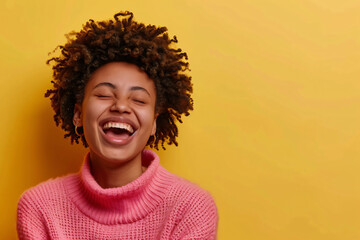 Photo of a black woman laughing heartily with her eyes closed, wearing a pink sweater isolated on a yellow background with studio lighting. In the style of an unknown artist.