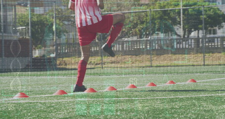 Image of colourful squares over male rugby players at stadium