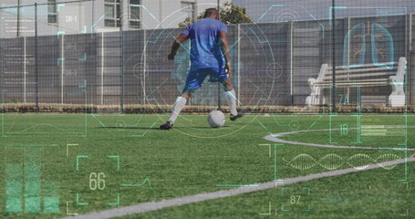 Image of interface processing data over african american male footballer ball training on pitch