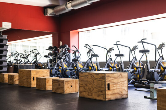 A modern gym equipped with stationary bikes for cardio workouts
