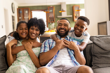 African American family enjoys a cheerful moment at home