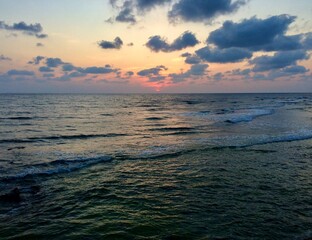 Obraz premium Sunset over the sea of Okinawa, Japan 