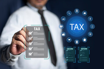 Businessman showing online tax forms personal income tax return for tax payment. pay online refund...