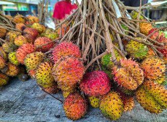 Fototapeta premium Close-up. Rambutan fruits at a market in Semarang, Central Java, Indonesia. 