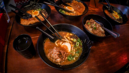 Delicious curry udon and ramen on the table in the Japanese restaurant