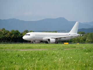 Airbus A320 at BGY Milano Bergamo airport. White aircraft livery. No airline company or carrier logo or livery