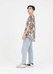 Naklejka premium Portrait of asian male confidence charming successful handsome young guy posing relex looking attractive standing on white background in studio - isolated