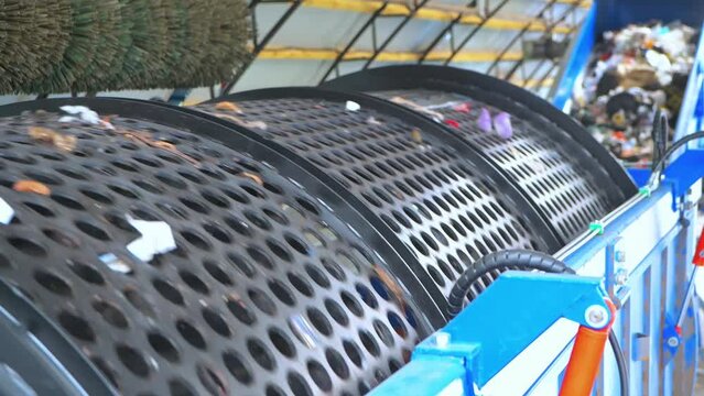 Conveyor with shredded plastic and waste sorting.Plastic recycling plant and household waste. Green ecology, problems of planet pollution.
