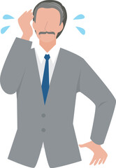 慌てて冷や汗をかく経営者の男性