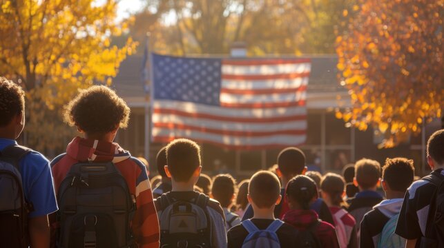 A diverse group of students gathering outdoors for a school assembly, with the American flag prominently displayed in the background. - Powered by Adobe