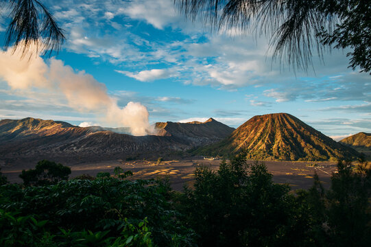 Volcanic landscape, vent, crater and smoke of a volcano