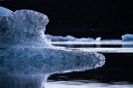Sunrise on the Skaftafell glacier in Iceland. Ice block detail