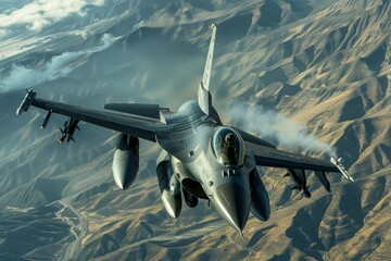 a fighter jet flying over a mountain range