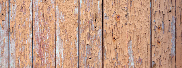Obraz premium wooden planks with peeling old grungy pink brown beige paint