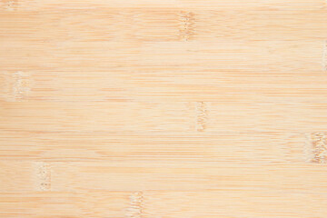 Natural wooden desk texture background, Top view. Abstract top bar table wood bamboo pattern nature. Design wall vintage interior kitchen. Bamboo skin cutting board empty for displaying products.