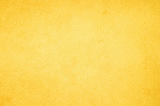 Yellow concrete stone texture for background in summer wallpaper. Cement and sand wall of tone vintage minimal. Concrete abstract wall of light yellow color, cement texture white blank for home decor.