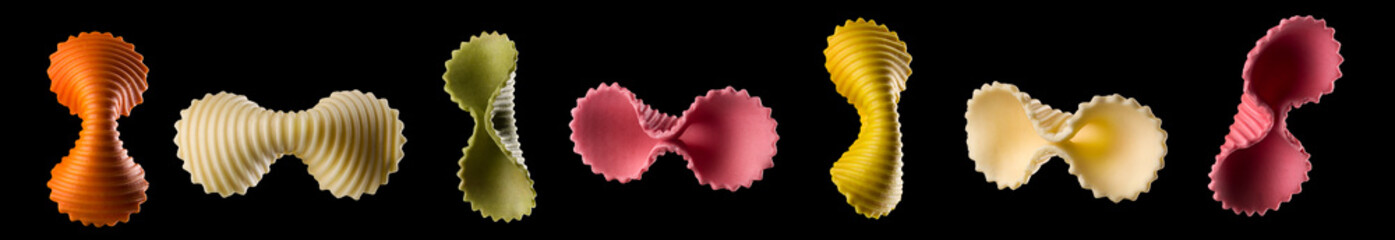 Macro photo of farfalle pasta isolated on black with clipping path