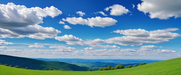 Fototapeta premium wonderful mountain landscape with green and blue cloudy sky