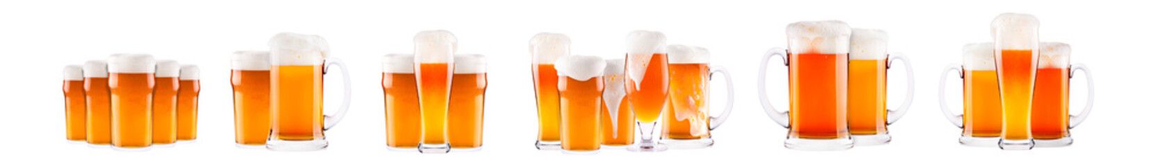 Set of fresh beer glasses with bubble froth isolated on white background.