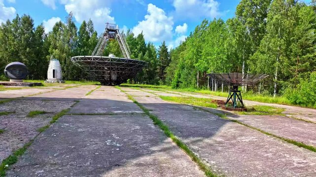 Abandoned radio telescopes at Ventspils International Radio Astronomy Center surrounded by nature