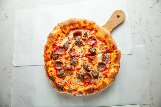 Naples authentic brick oven pizza, pepperoni and all meat