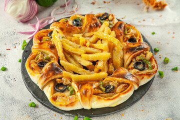 Chicken Fajita stuffed naan served with french fries, Pakistani fusion food.