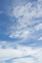 Blue sky and white puffy clouds.